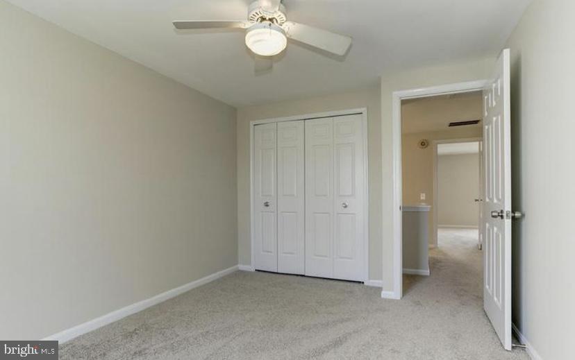 613 Concerto Lane Silver Spring, MD 20901 - Photo 15 of 23 an empty room with a bathroom and a sink