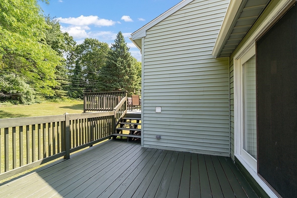 4 Ridgemont Drive Londonderry, NH 03053 - Photo 28 of 33 a view of a balcony with wooden floor