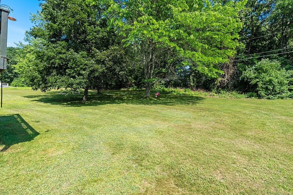 4 Ridgemont Drive Londonderry, NH 03053 - Photo 30 of 33 a view of a field with a tree