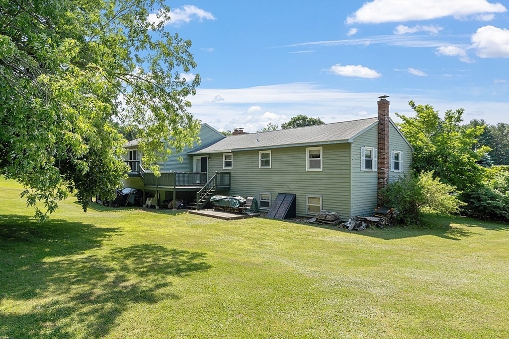 4 Ridgemont Drive Londonderry, NH 03053 - Photo 32 of 33 a view of a house with a yard