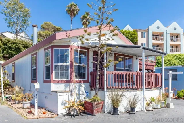 a front view of a house with street