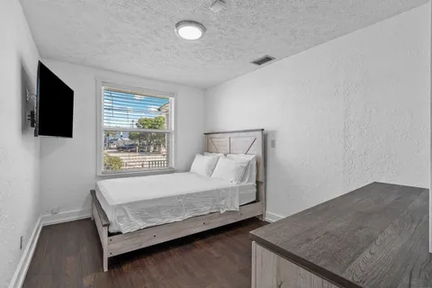 a bathroom with a toilet sink shower and bathtub