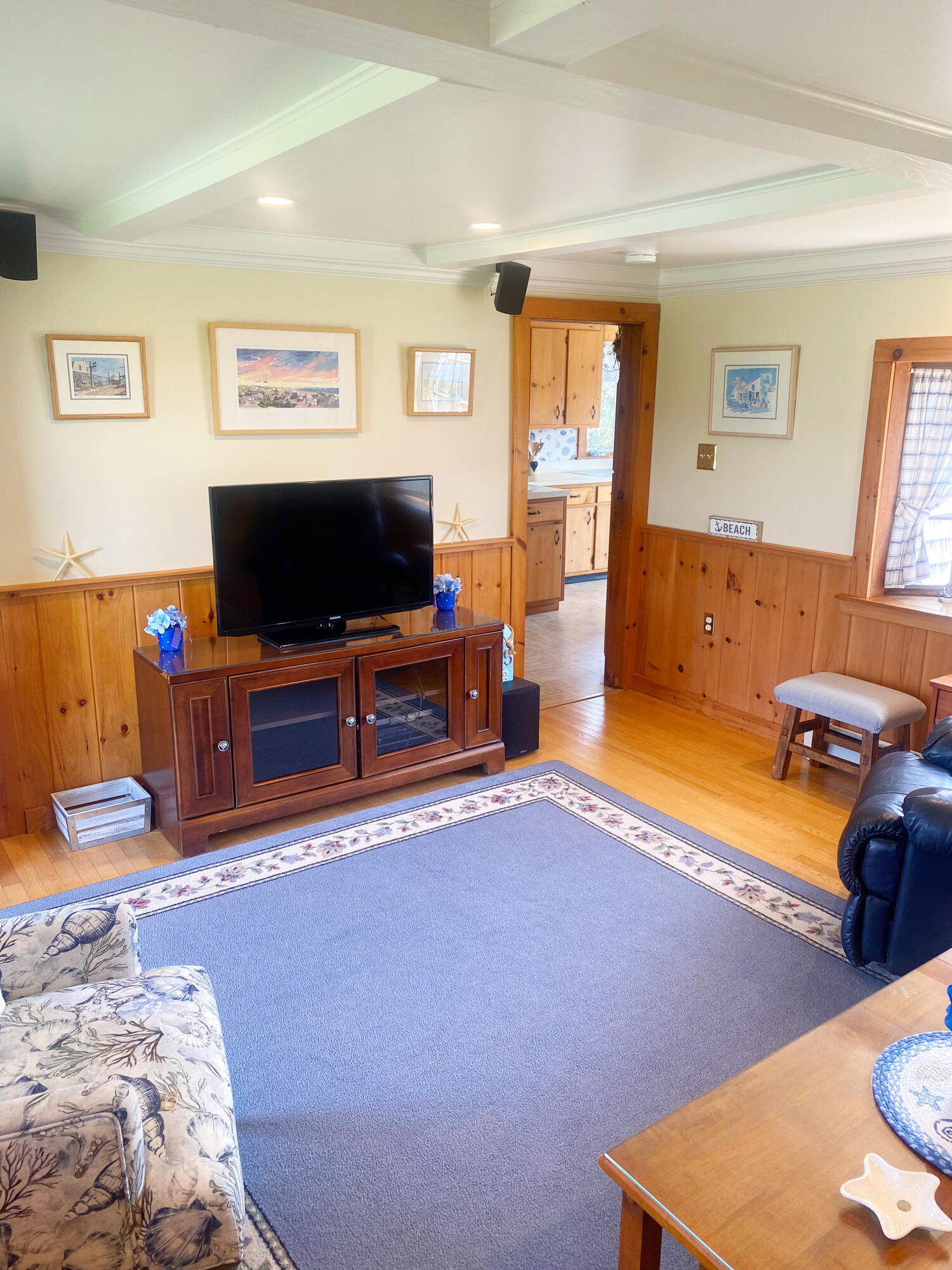 1090 Craigville Beach Road Centerville, MA 02632 - Photo 15 of 33 a living room with furniture and a flat screen tv