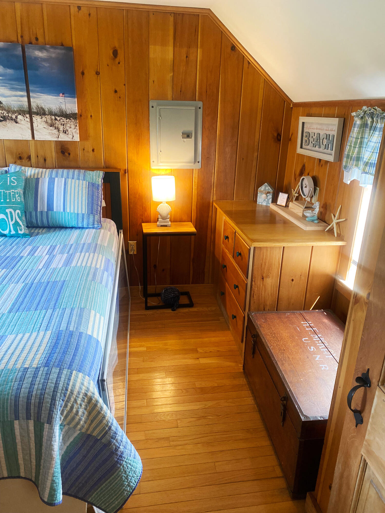 1090 Craigville Beach Road Centerville, MA 02632 - Photo 17 of 33 a living room with furniture and a wooden floor