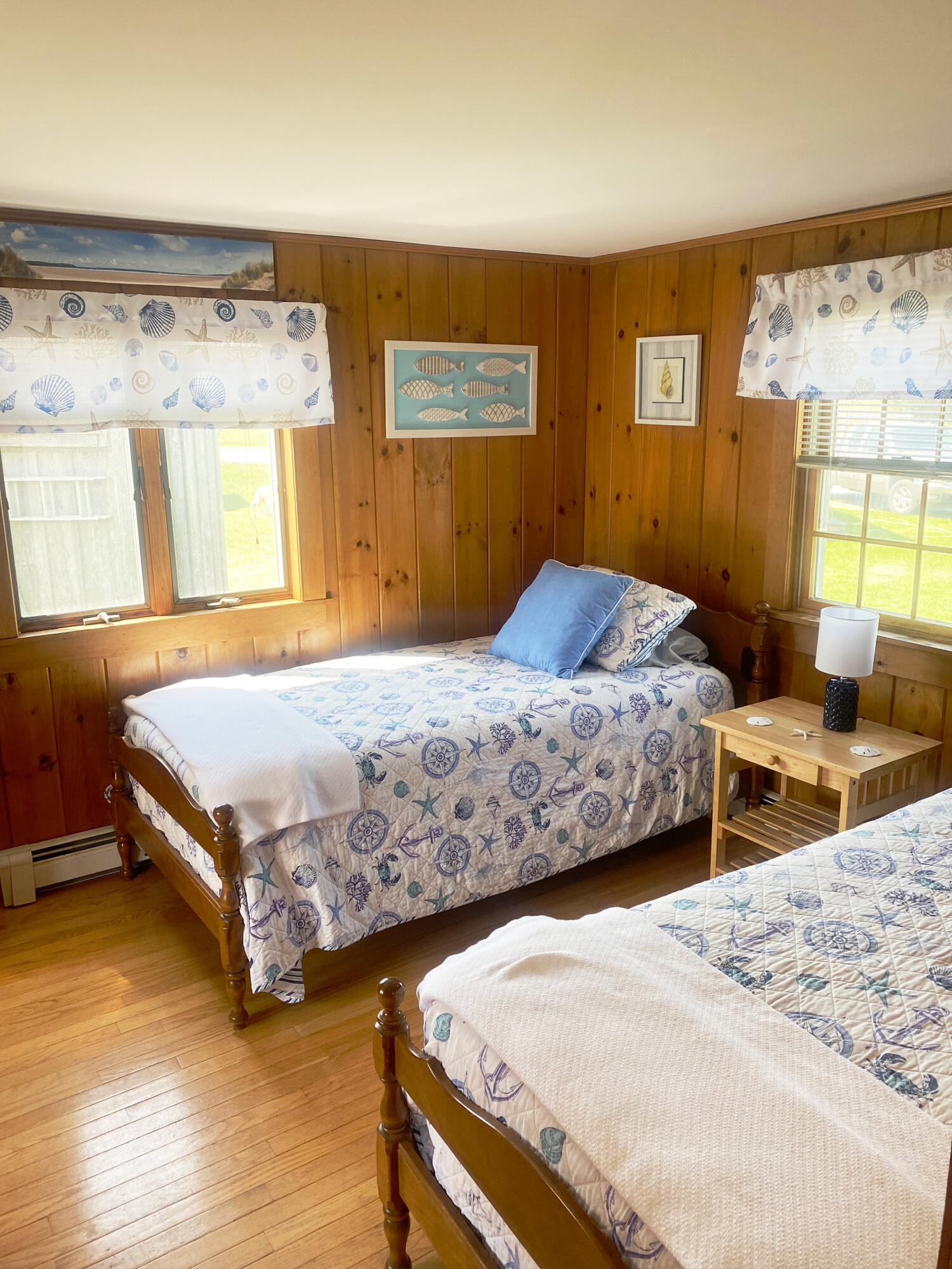 1090 Craigville Beach Road Centerville, MA 02632 - Photo 20 of 33 a bedroom with a bed and window