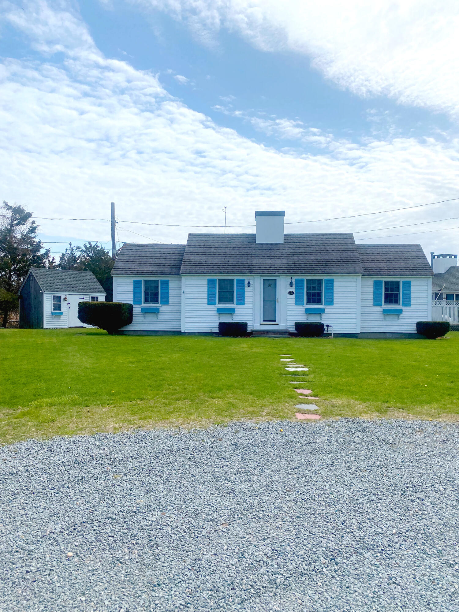 1090 Craigville Beach Road Centerville, MA 02632 - Photo 2 of 33 a house view with swimming pool and garden