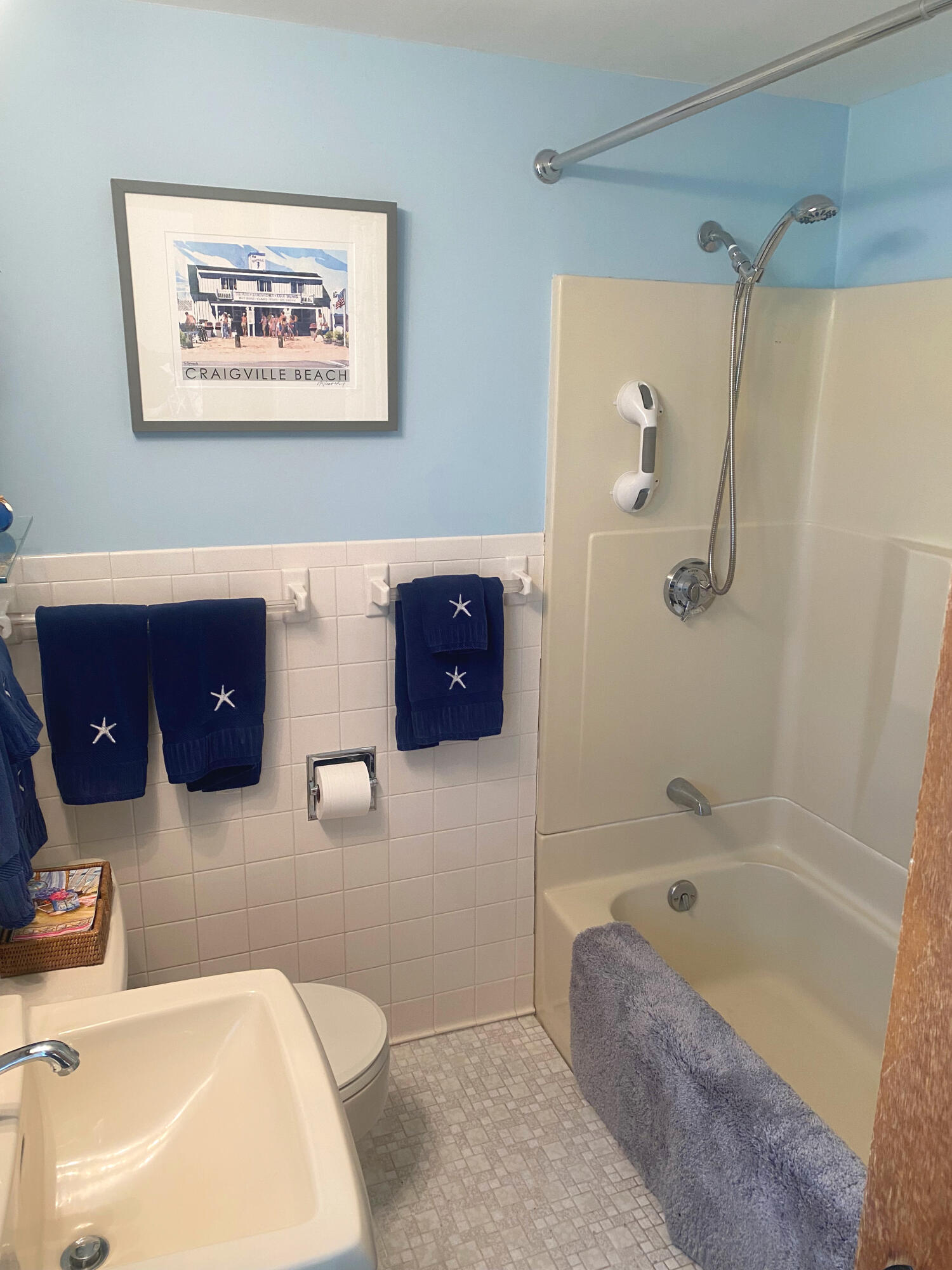 1090 Craigville Beach Road Centerville, MA 02632 - Photo 30 of 33 a bathroom with a tub a toilet and a shower