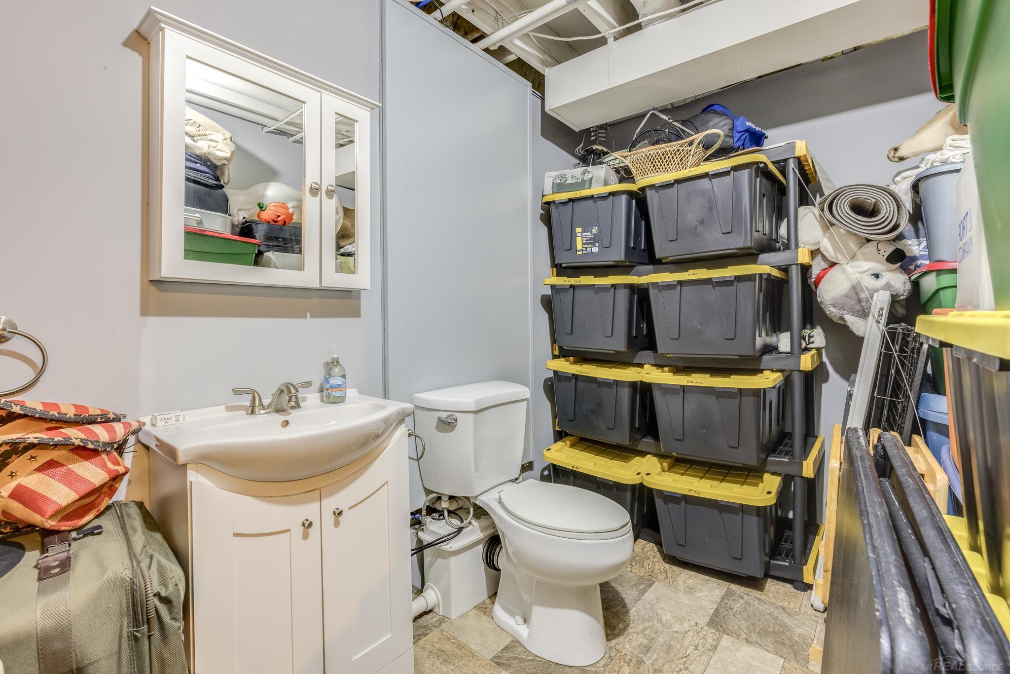 5674 Galbraith Line Road Croswell, MI 48422 - Photo 24 of 34 Lower Level Half Bath