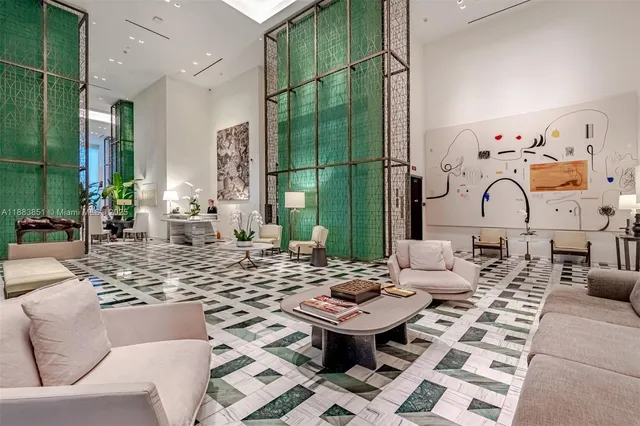 a view of a balcony with a couch and wooden floor