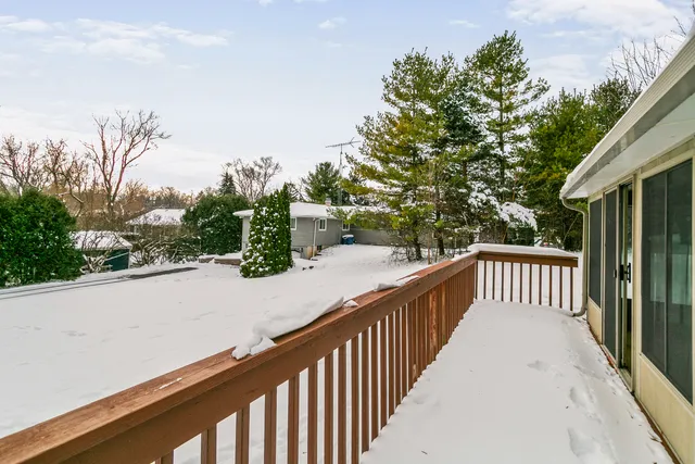 a view of a balcony with trees