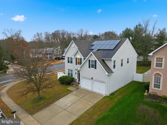 a view of house with garden