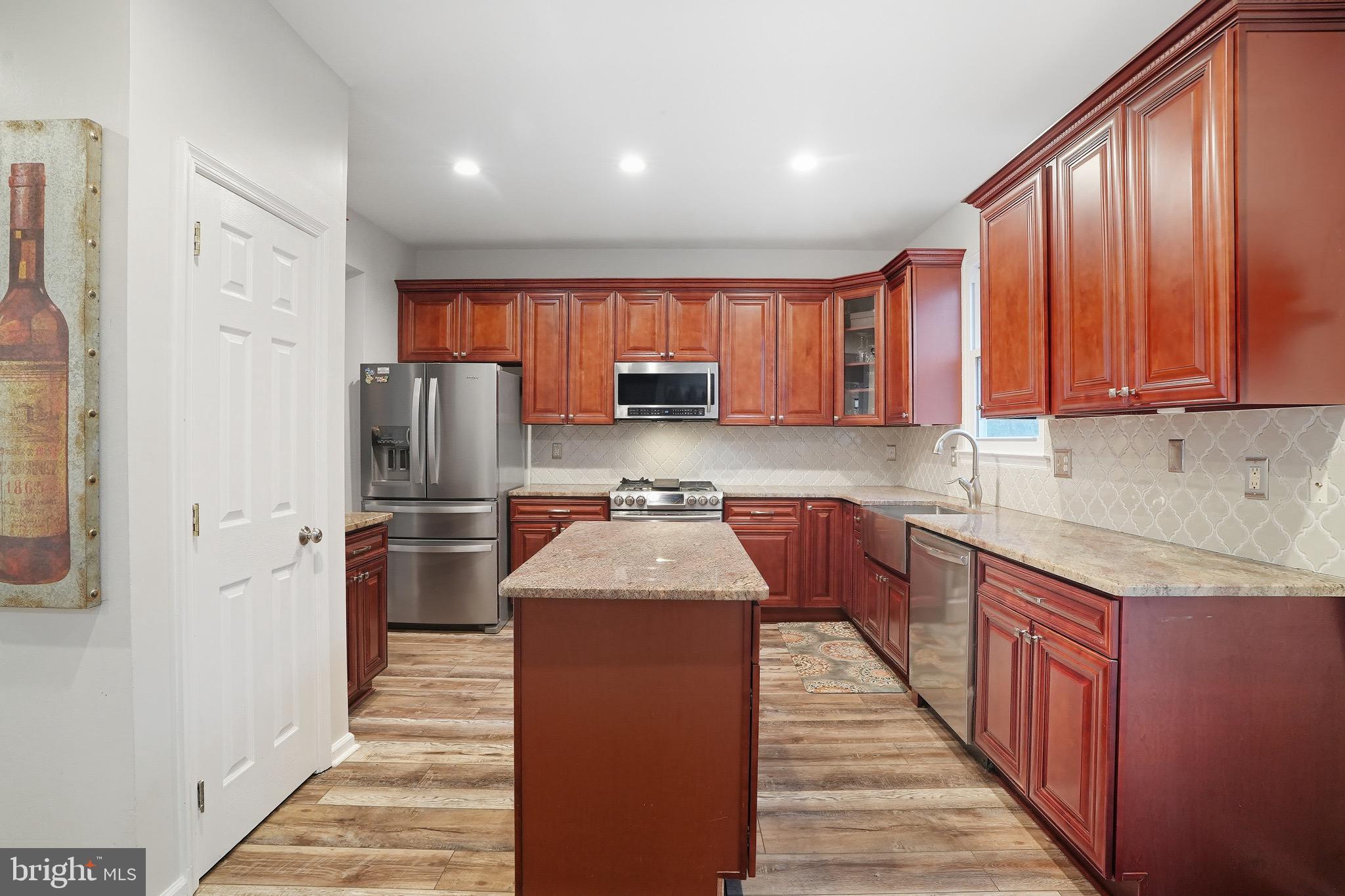 2 Jerrys Court Sicklerville, NJ 08081 - Photo 13 of 41 a kitchen with stainless steel appliances granite countertop a refrigerator sink and cabinets