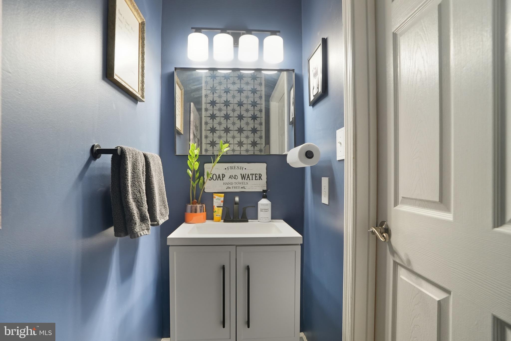 2 Jerrys Court Sicklerville, NJ 08081 - Photo 18 of 41 a bathroom with a sink a mirror and shower