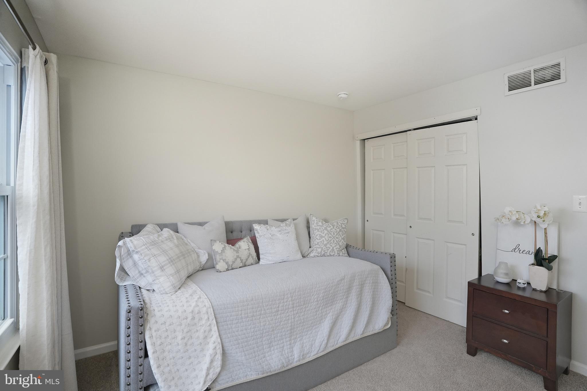 2 Jerrys Court Sicklerville, NJ 08081 - Photo 22 of 41 a bedroom with a bed and a mirror