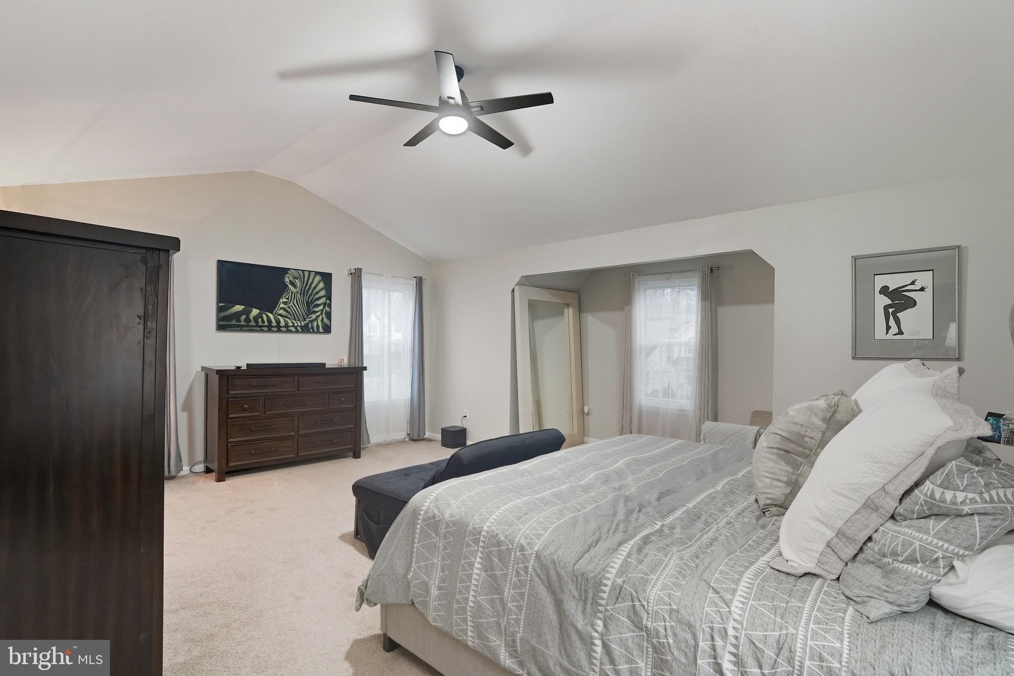2 Jerrys Court Sicklerville, NJ 08081 - Photo 29 of 41 a bedroom with a bed and a chandelier