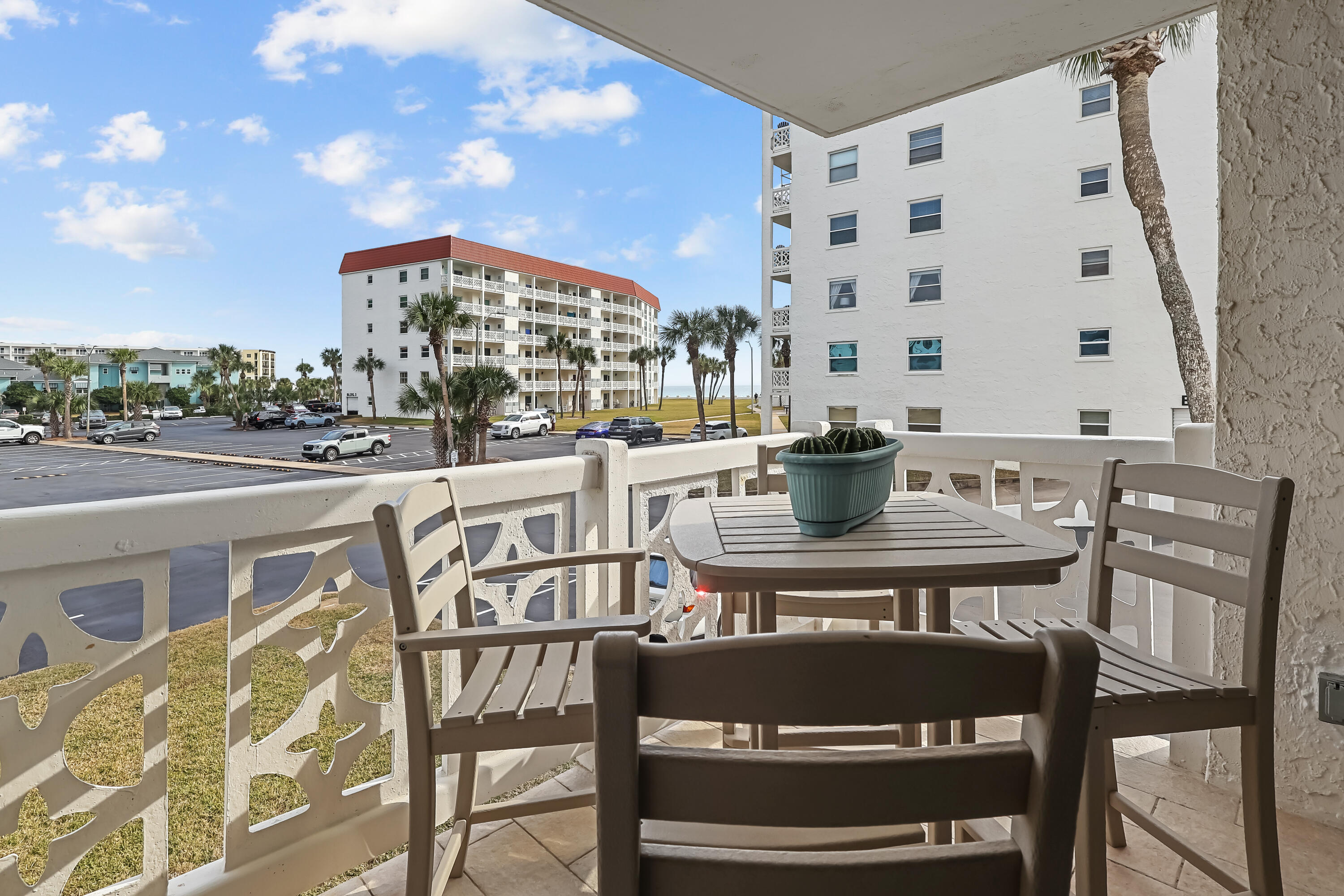 909 Santa Rosa Boulevard, Unit 229 Fort Walton Beach, FL 32548 - Photo 14 of 48 a view of a dining room with furniture and chandelier