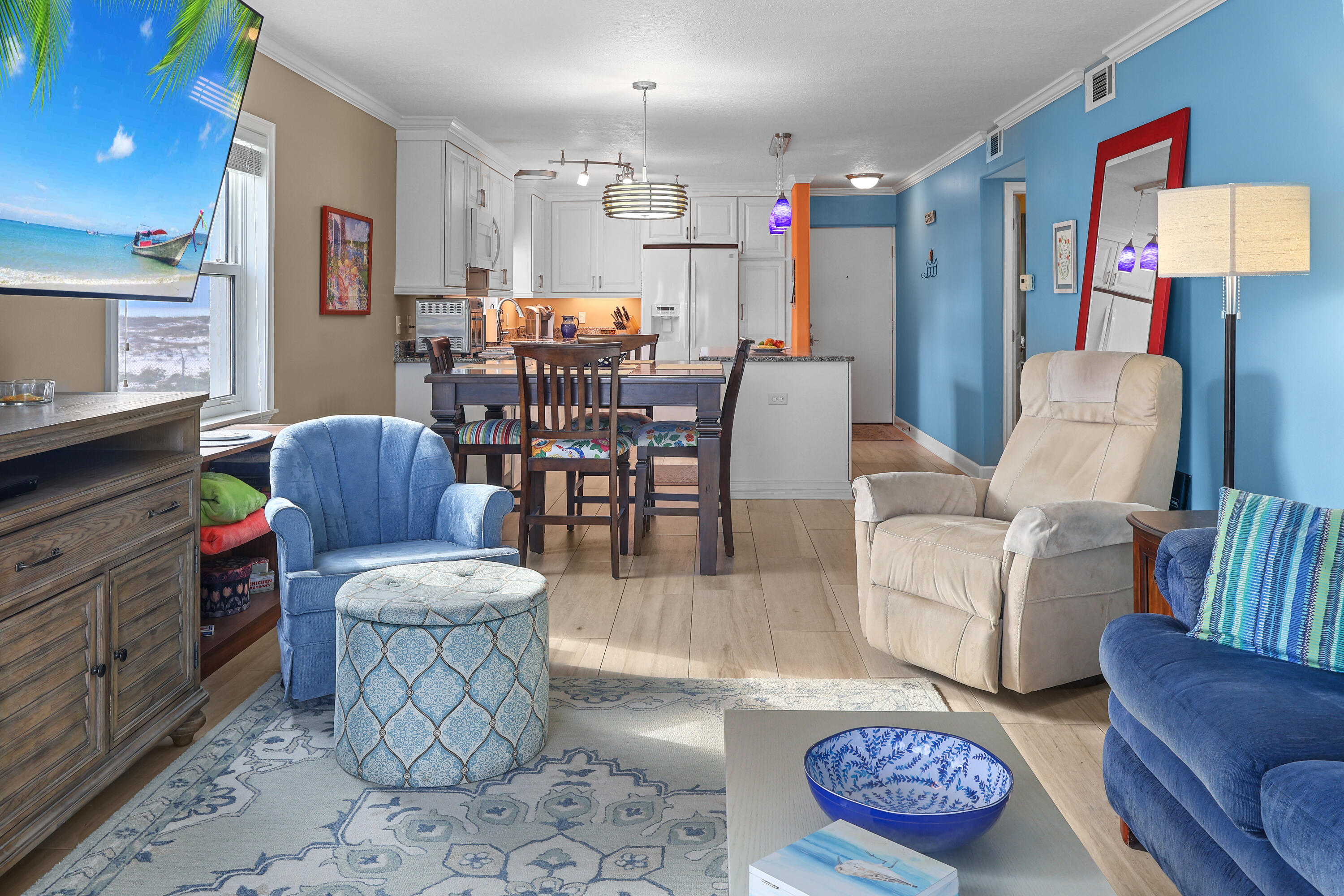 909 Santa Rosa Boulevard, Unit 229 Fort Walton Beach, FL 32548 - Photo 20 of 48 a living room with furniture and a wooden floor