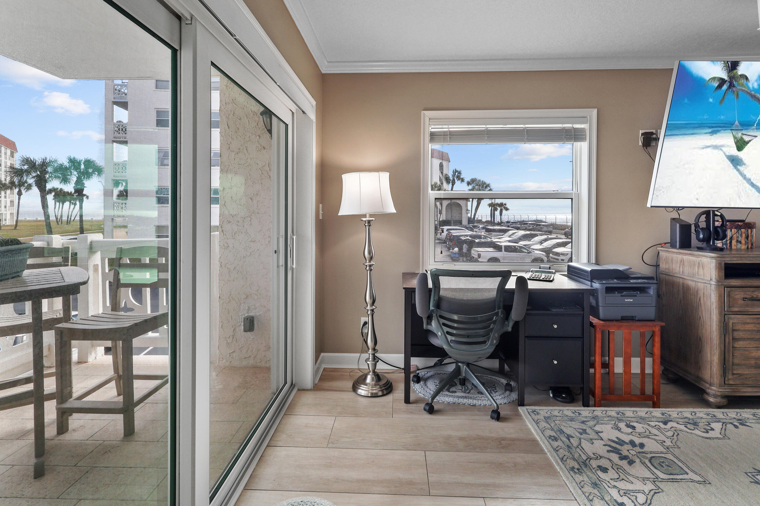 909 Santa Rosa Boulevard, Unit 229 Fort Walton Beach, FL 32548 - Photo 22 of 48 a view of a workspace with furniture and a window