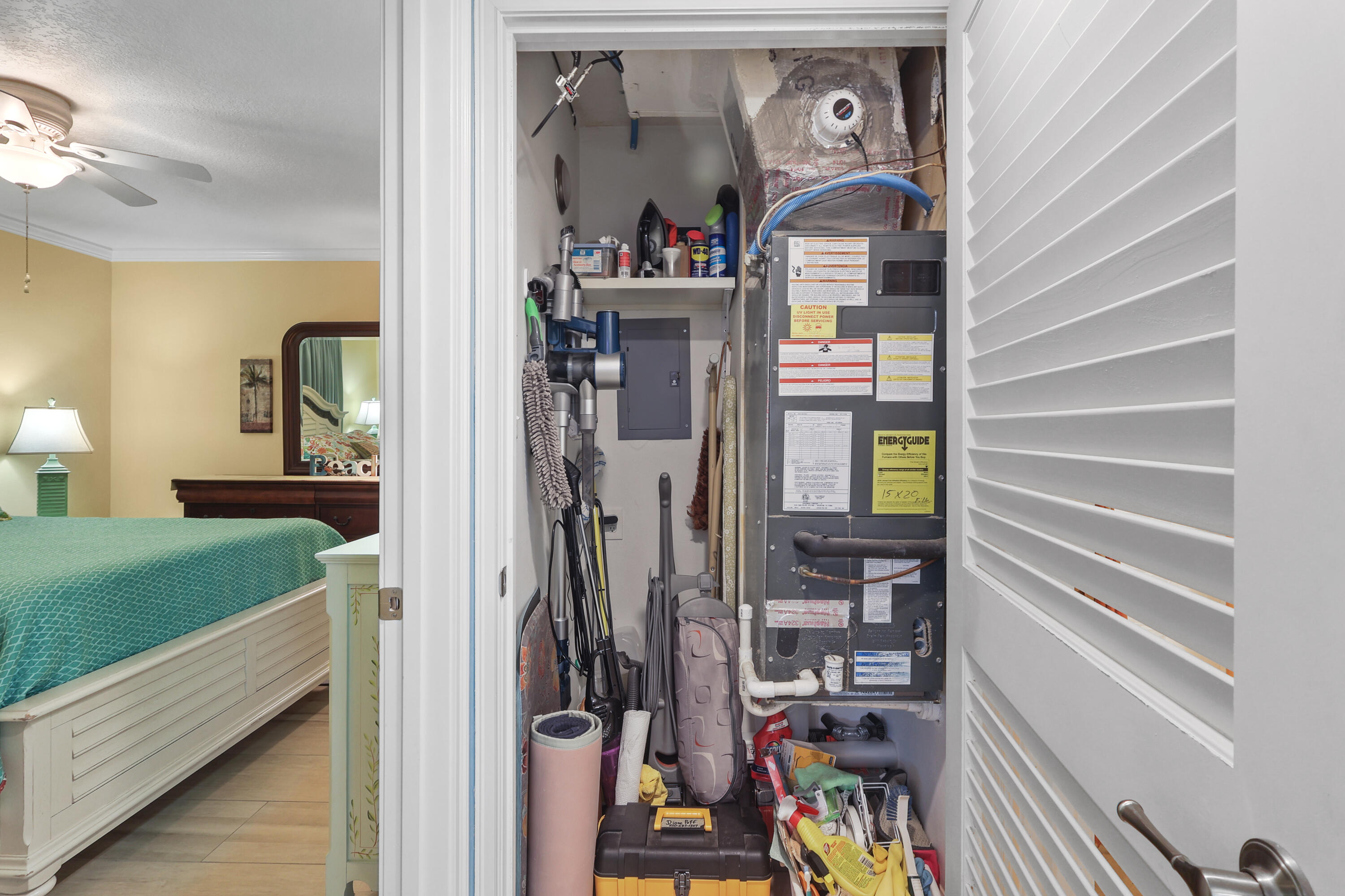 909 Santa Rosa Boulevard, Unit 229 Fort Walton Beach, FL 32548 - Photo 33 of 48 a view of a hallway with a livingroom with furniture