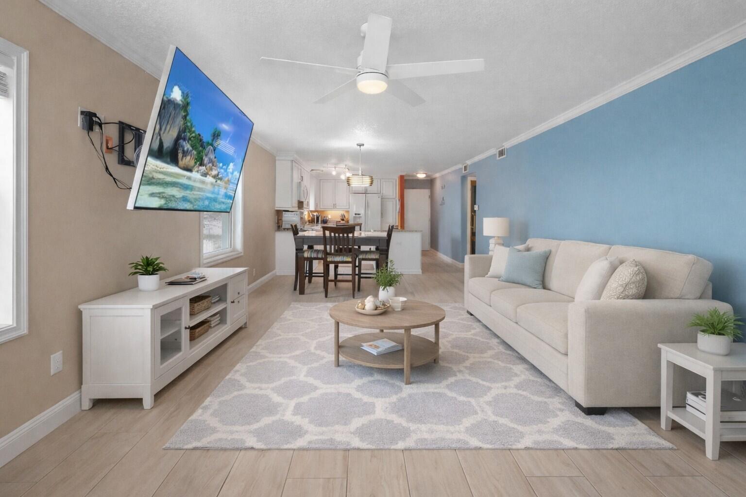 909 Santa Rosa Boulevard, Unit 229 Fort Walton Beach, FL 32548 - Photo 36 of 48 a living room with furniture and view of kitchen