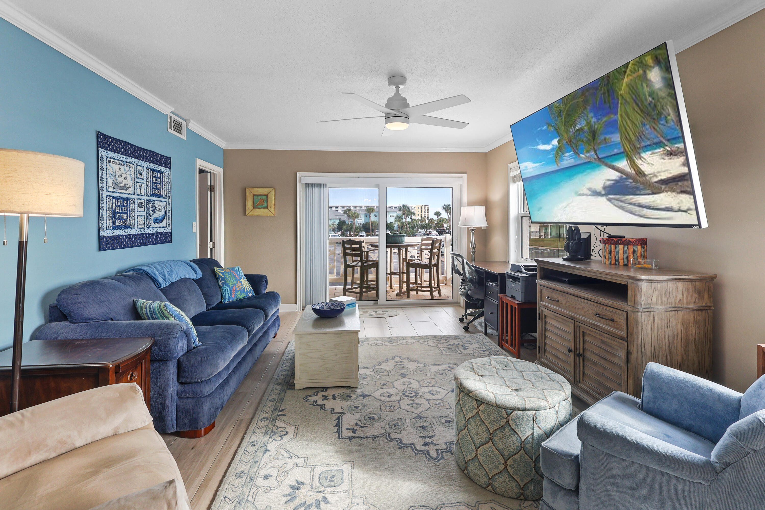 909 Santa Rosa Boulevard, Unit 229 Fort Walton Beach, FL 32548 - Photo 4 of 48 a living room with furniture and a large window