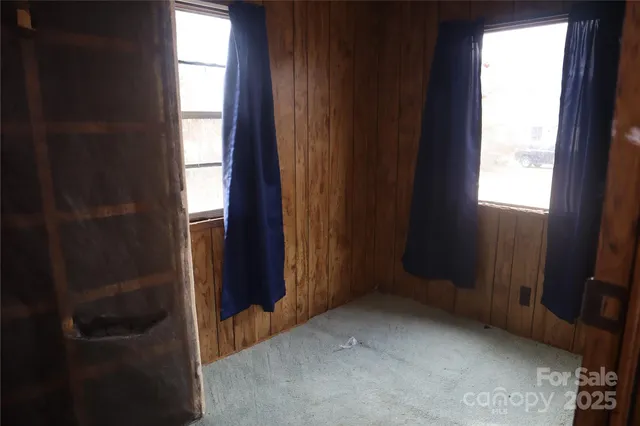 a view of an empty room and window