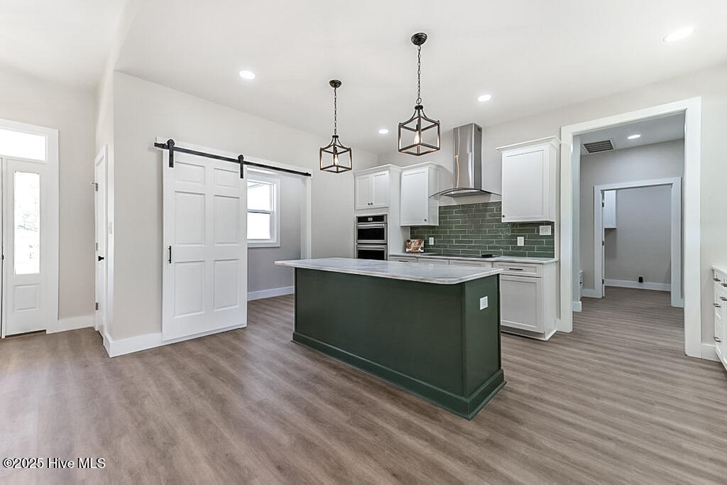 1104 Soundside Road Edenton, NC 27932 - Photo 18 of 58 View of butlers pantry with sliding doors