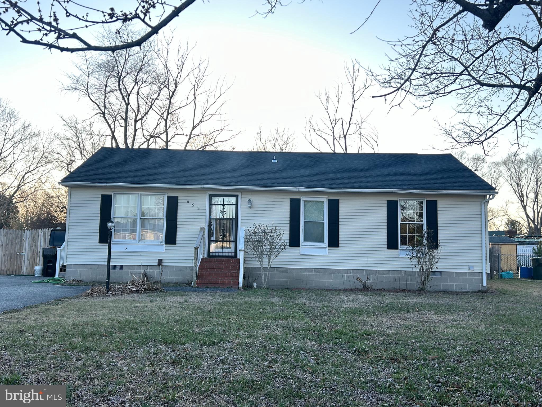 a front view of house with yard