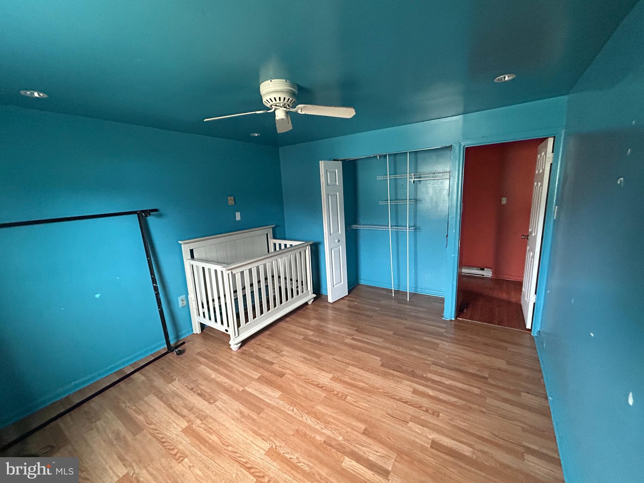 608 Spring Garden Avenue Salisbury, MD 21804 - Photo 11 of 19 a view of a room with a hanging light and carpet