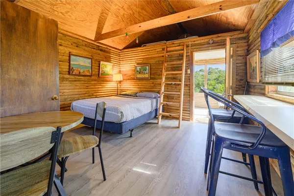 a bathroom with a sink a mirror and shower curtain