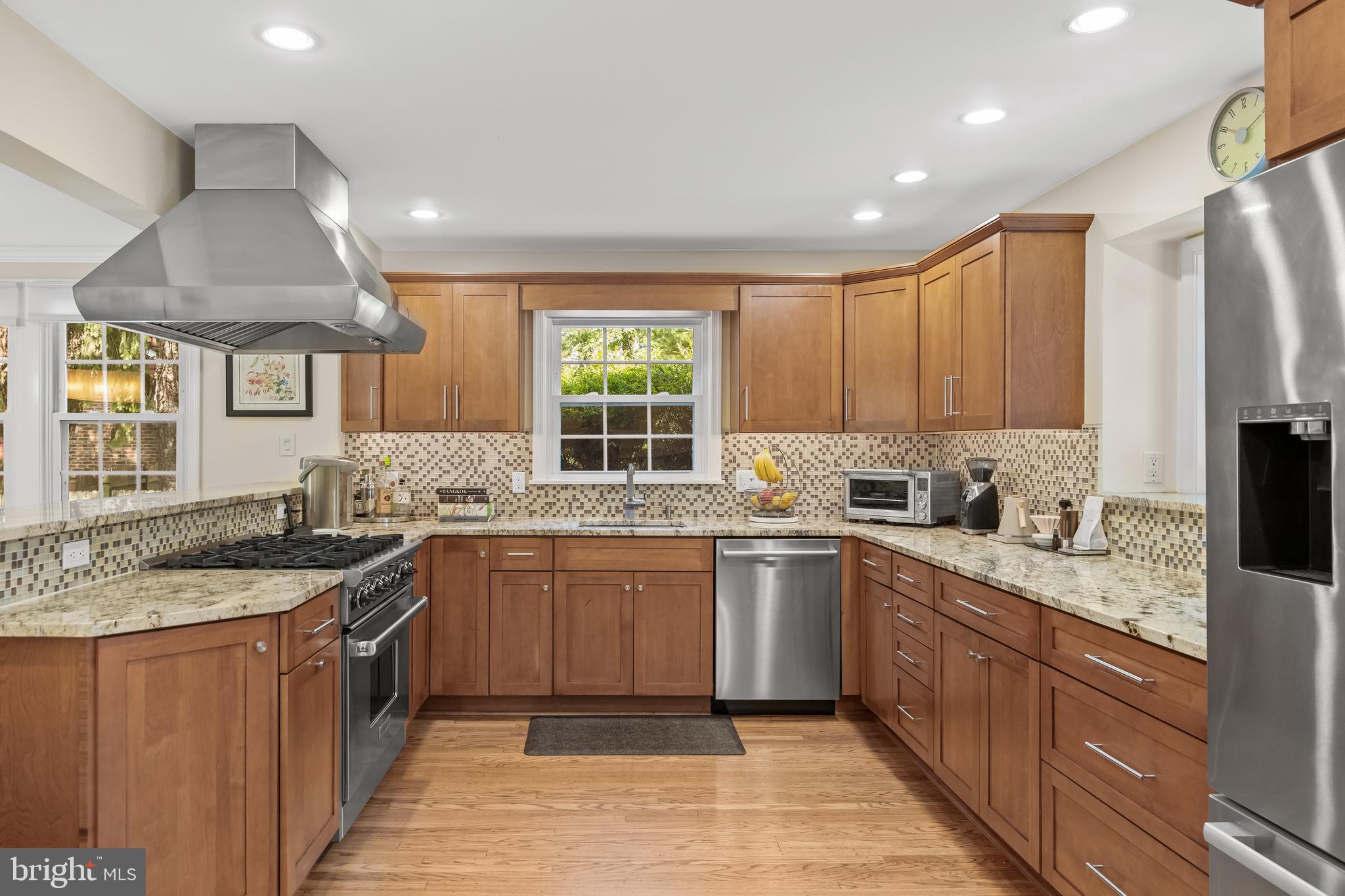 4 Rooftree Road Cherry Hill, NJ 08003 - Photo 11 of 42 a kitchen with a sink stove and cabinets