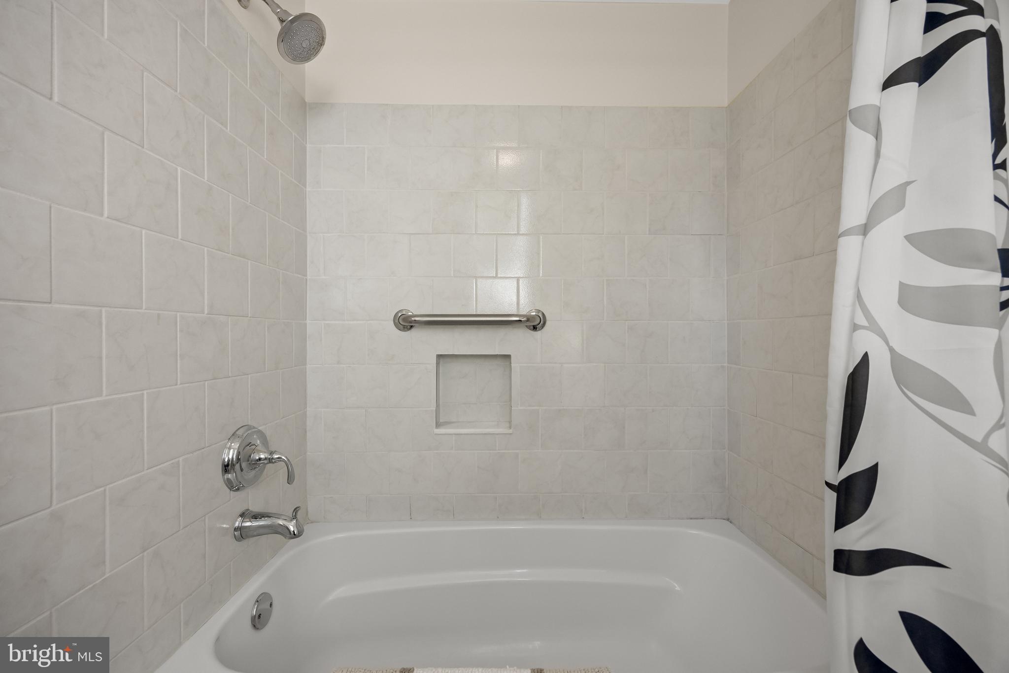 4 Rooftree Road Cherry Hill, NJ 08003 - Photo 29 of 42 a bathroom with a bathtub