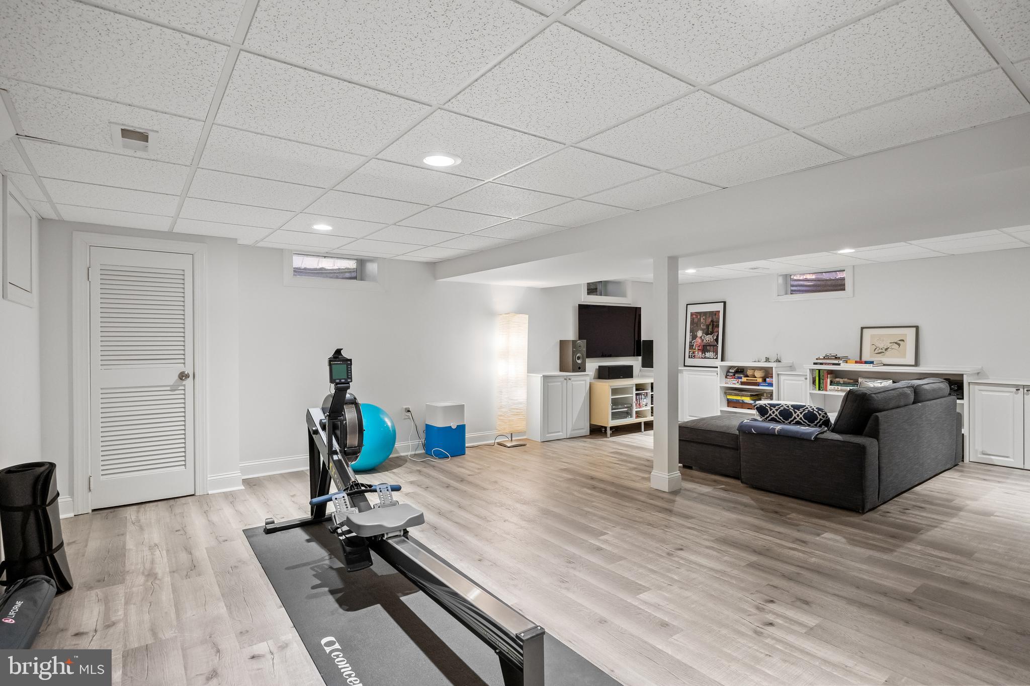 4 Rooftree Road Cherry Hill, NJ 08003 - Photo 32 of 42 a living room with furniture and a flat screen tv