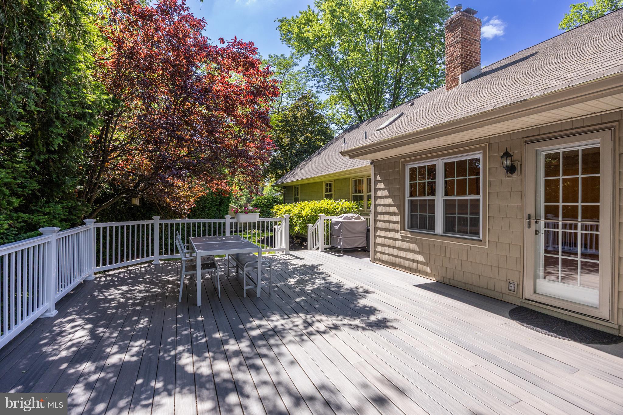 4 Rooftree Road Cherry Hill, NJ 08003 - Photo 35 of 42 a view of a patio with a table chairs and backyard