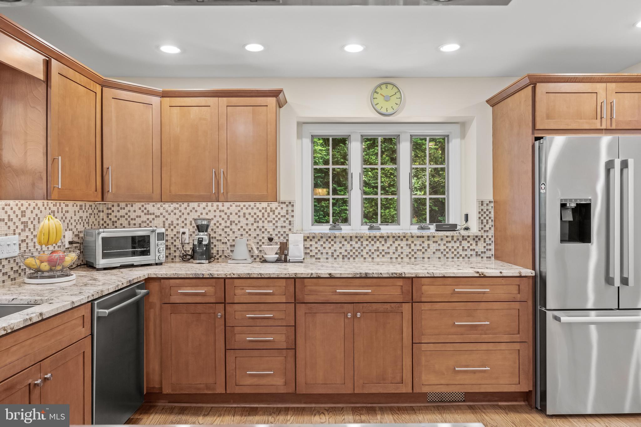 4 Rooftree Road Cherry Hill, NJ 08003 - Photo 9 of 42 a kitchen with granite countertop cabinets and refrigerator