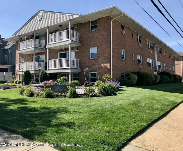 a view of a building with garden