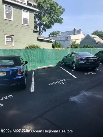 a car parked in front of a house