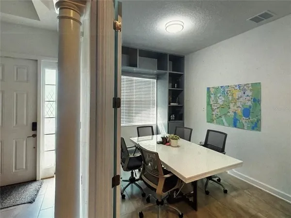 a view of a dining room with furniture
