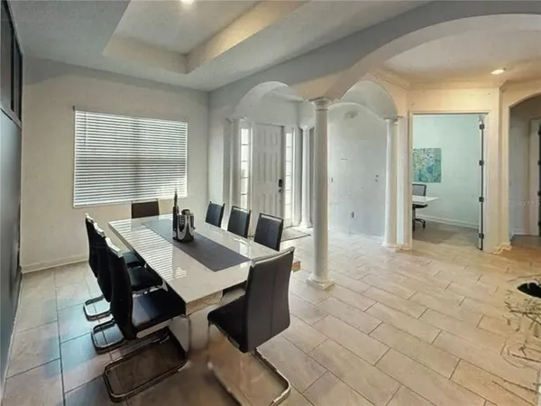 a view of a dining room with furniture