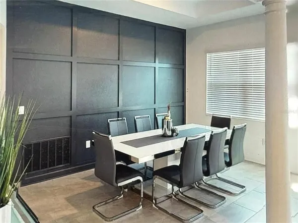 a view of a dining room with furniture