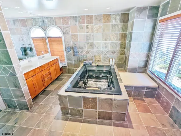a view of a kitchen with a sink and a stove
