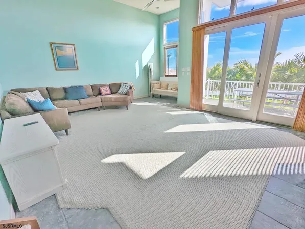 a living room with a couch and a table