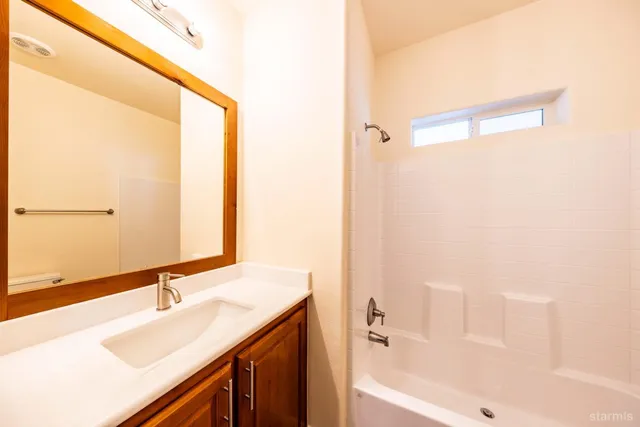 a bathroom with a sink and a bathtub