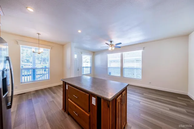 a view of kitchen and windows