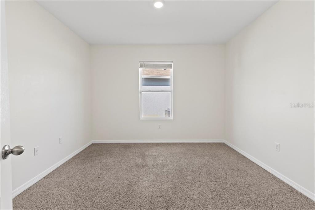 205 Old Mill Pond Road Palm Harbor, FL 34683 - Photo 12 of 57 a view of an empty room