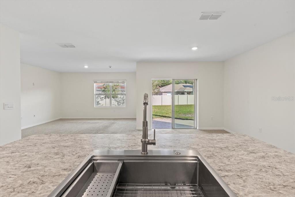 205 Old Mill Pond Road Palm Harbor, FL 34683 - Photo 21 of 57 a view of a kitchen counter top space