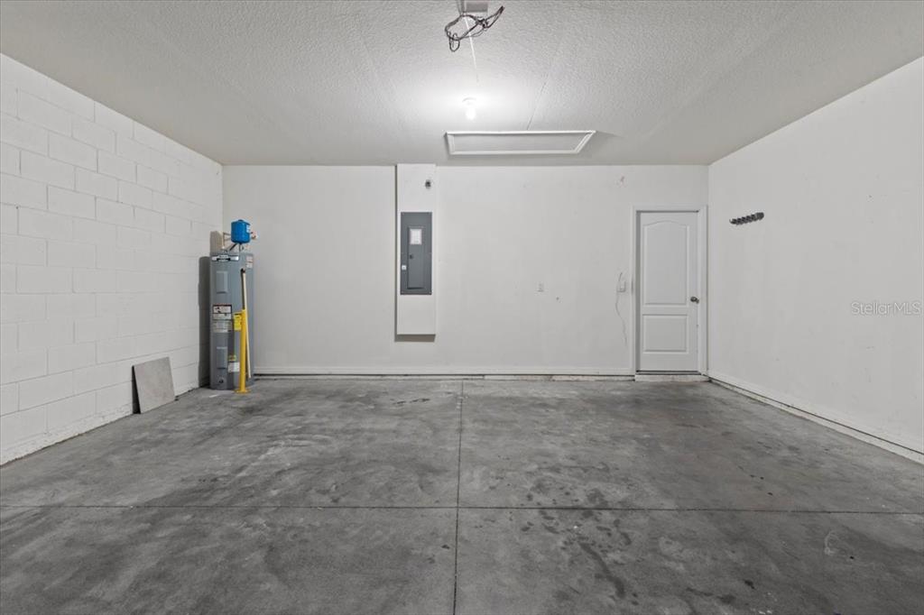 205 Old Mill Pond Road Palm Harbor, FL 34683 - Photo 37 of 57 a view of an empty room