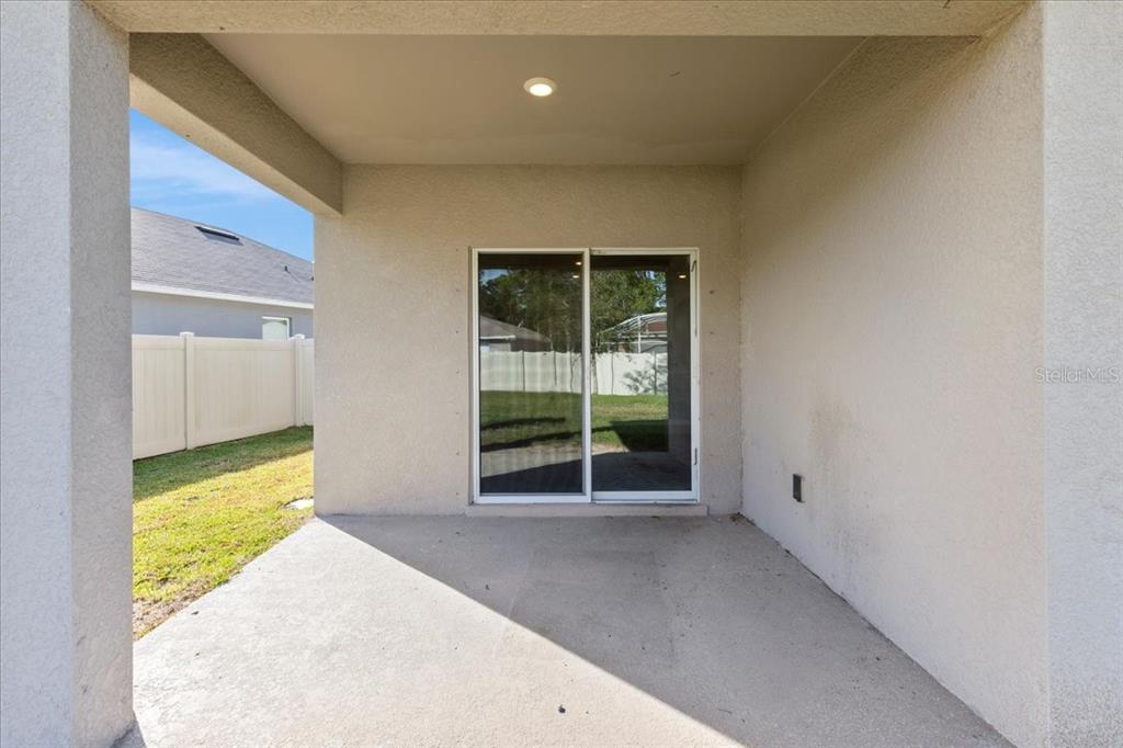 205 Old Mill Pond Road Palm Harbor, FL 34683 - Photo 38 of 57 a view of an empty room with a window