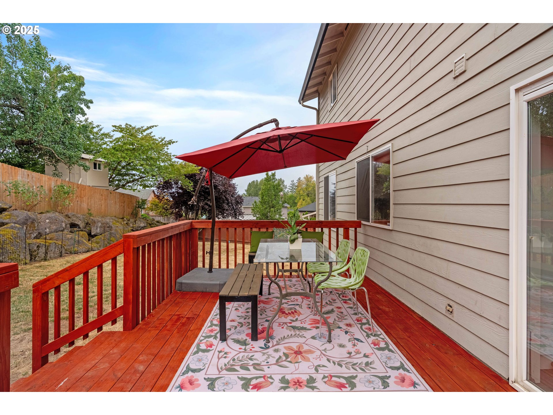 4043 Southeast Harmony Place Camas, WA 98607 - Photo 30 of 40 a view of a wooden deck with furniture