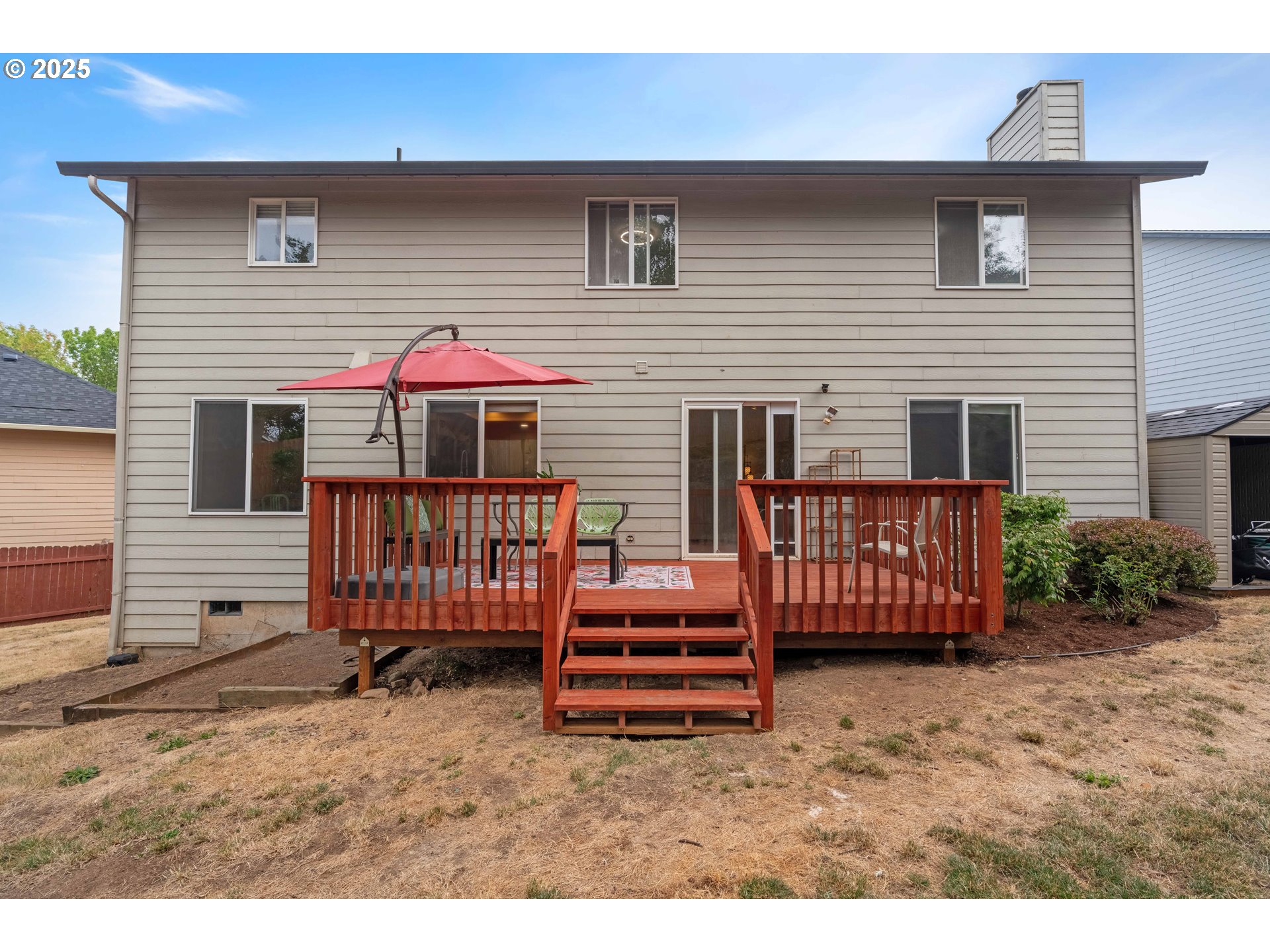 4043 Southeast Harmony Place Camas, WA 98607 - Photo 33 of 40 a backyard of a house with a deck